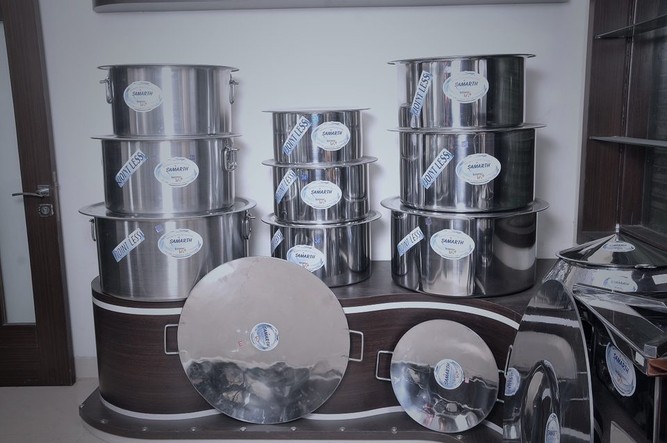 Samarth Cookware jointless patilas and tawas on display