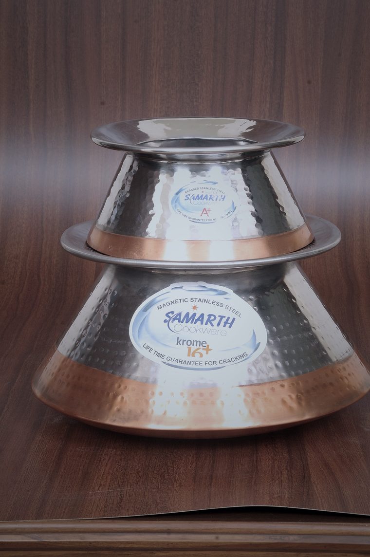 Hammered stainless steel biryani degda with a thick copper base