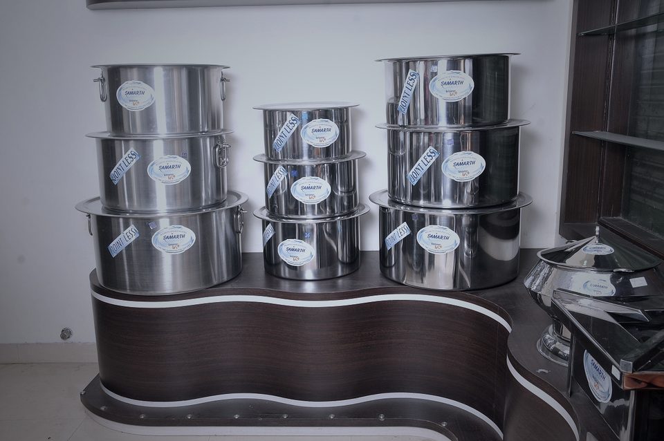 Nested jointless patilas in the Samarth Cookware showroom